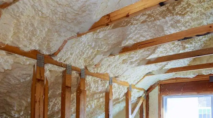 exposed interior drywall with insulation fiber